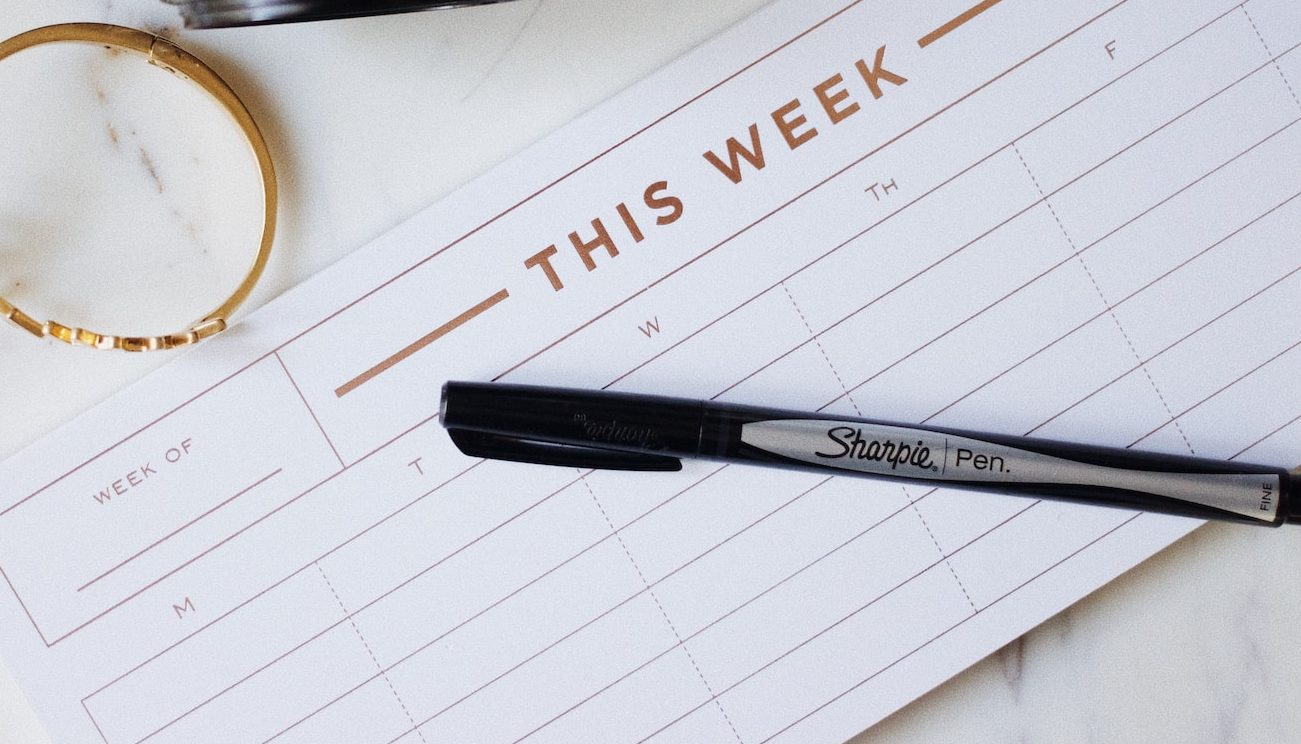 closeup photo of ballpoint pen near camera
